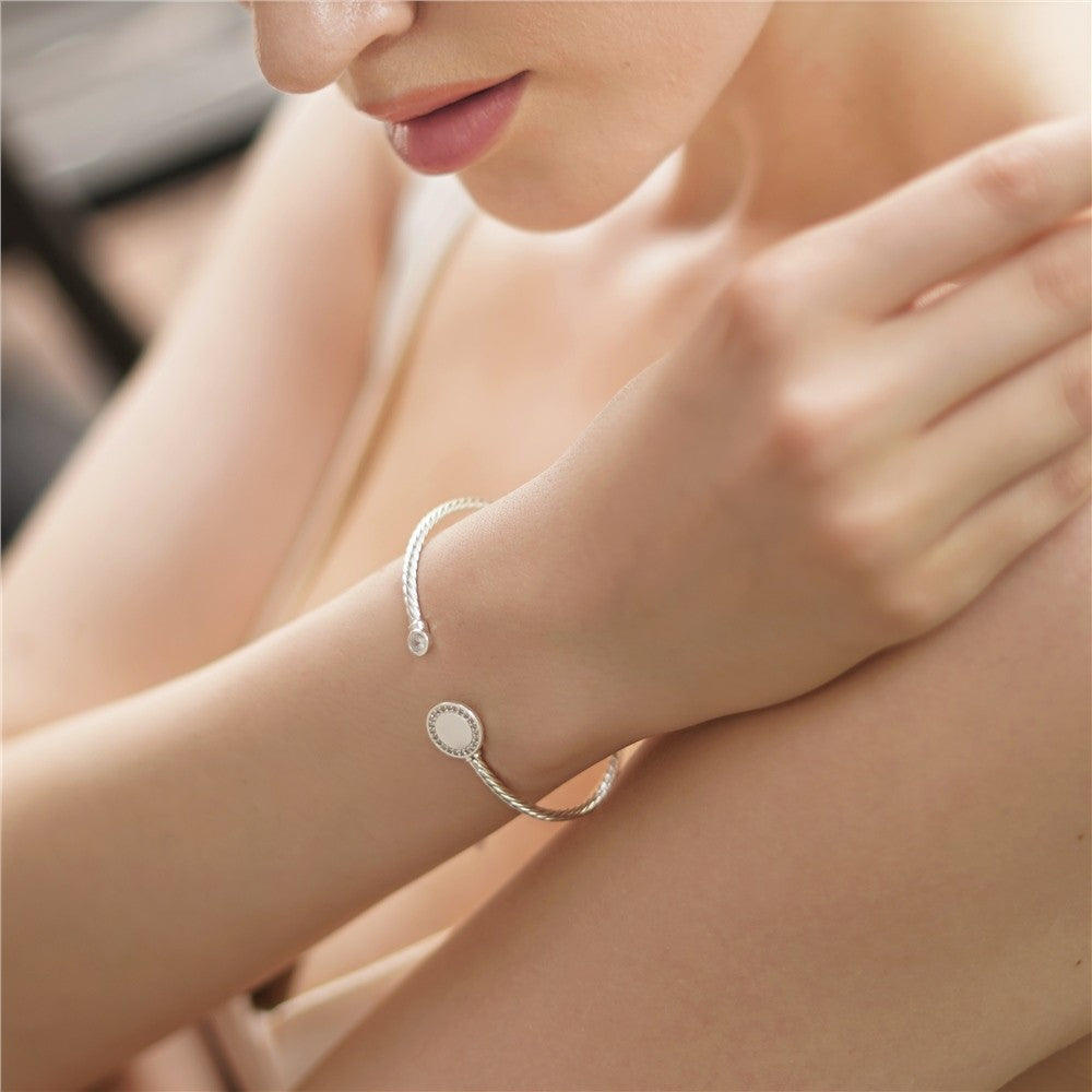 Newbridge Silverware Circular Twist Clear Stone Bangle with Clear Stones